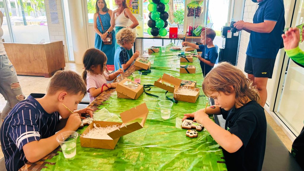Kids doing art activities during a birthday party