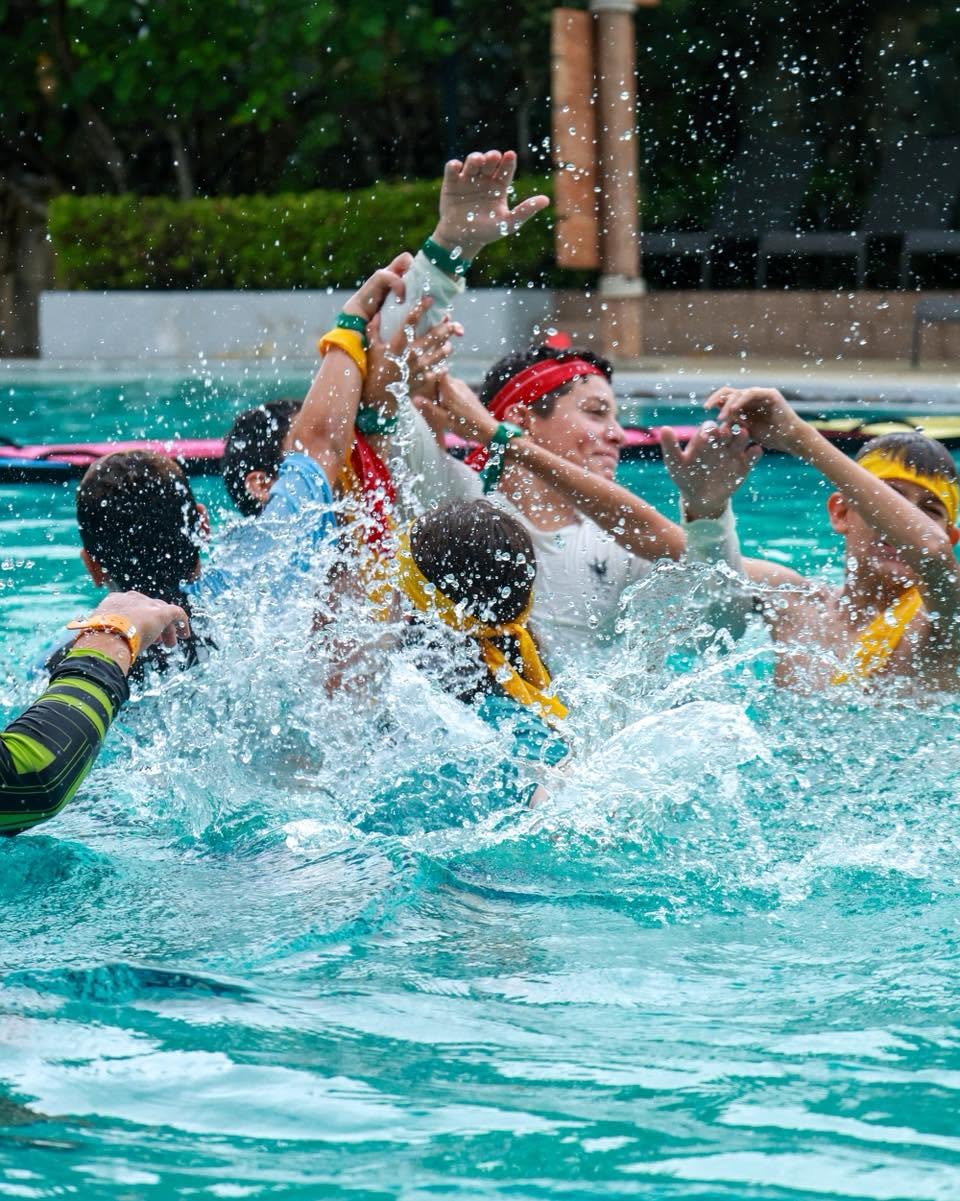 Lighthouse International School students having a team game
